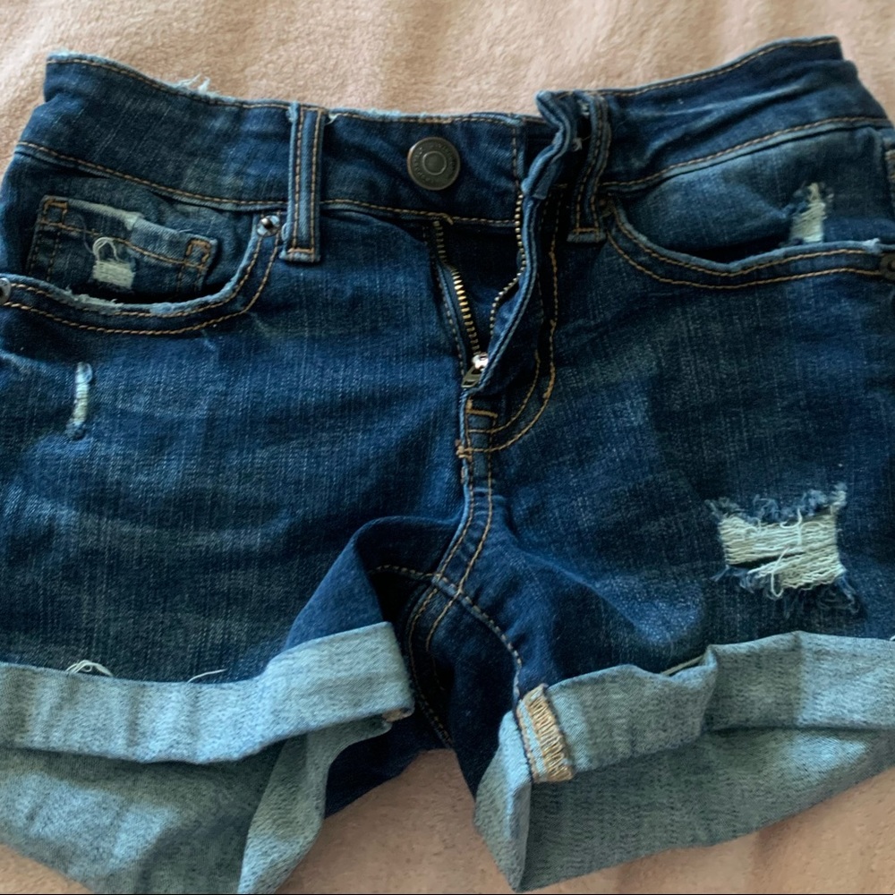 girls dark blue ripped jean shorts